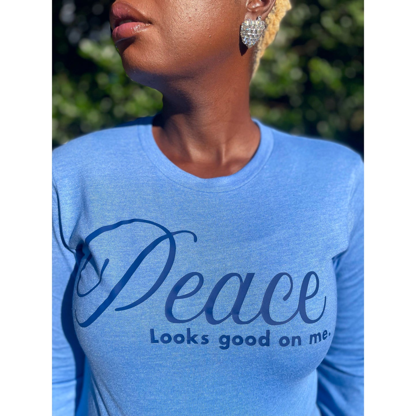 Peace Looks Good On Me Heather blue long sleeve t-shirt with navy blue lettering — cozy Faith-based apparel for women