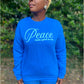 Peace Looks Good On Me royal blue sweatshirt with light blue lettering — Christian lifestyle brand
