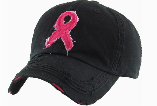 Black cap with a pink breast cancer awareness ribbon on a white background