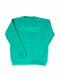 kelly green sweatshirt with puff wording saying "confidence looks food on me" on white background